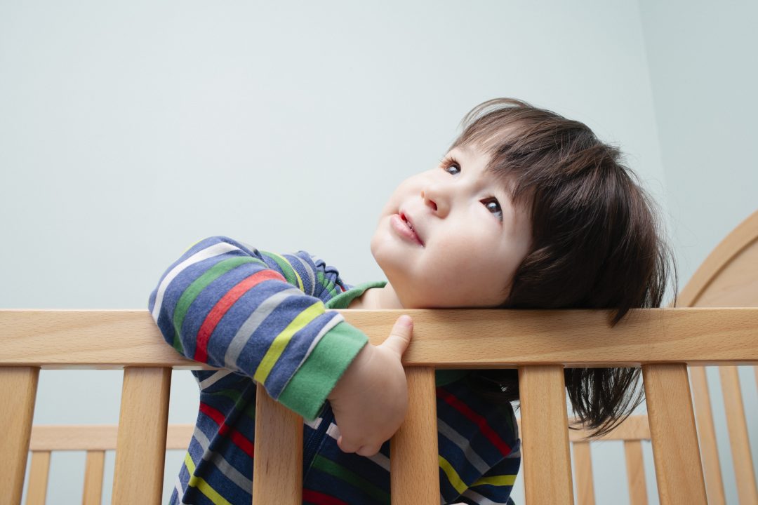 Little boy looking upwards